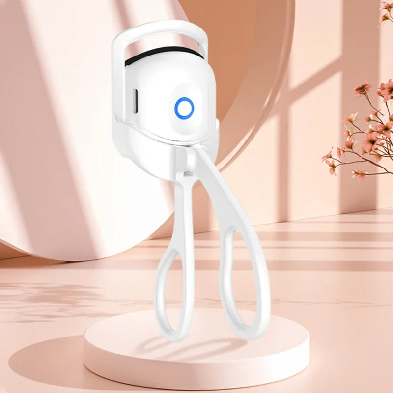 Electric eyelash curler, heated eyelash curler, curling device